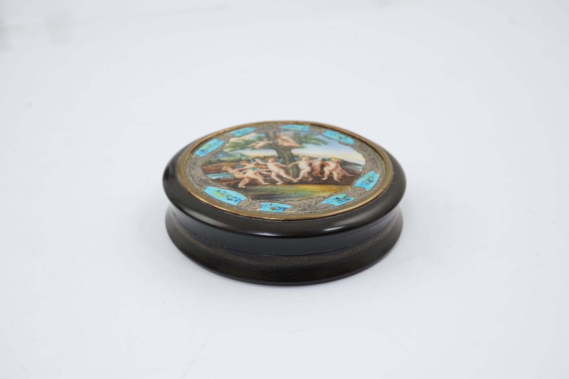 A 19th century Italian? silver and enamel mounted circular tortoiseshell box and cover